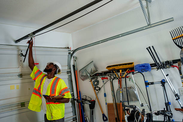 Professional Garage Door Panel Replacement technician working in Beaverton, MI